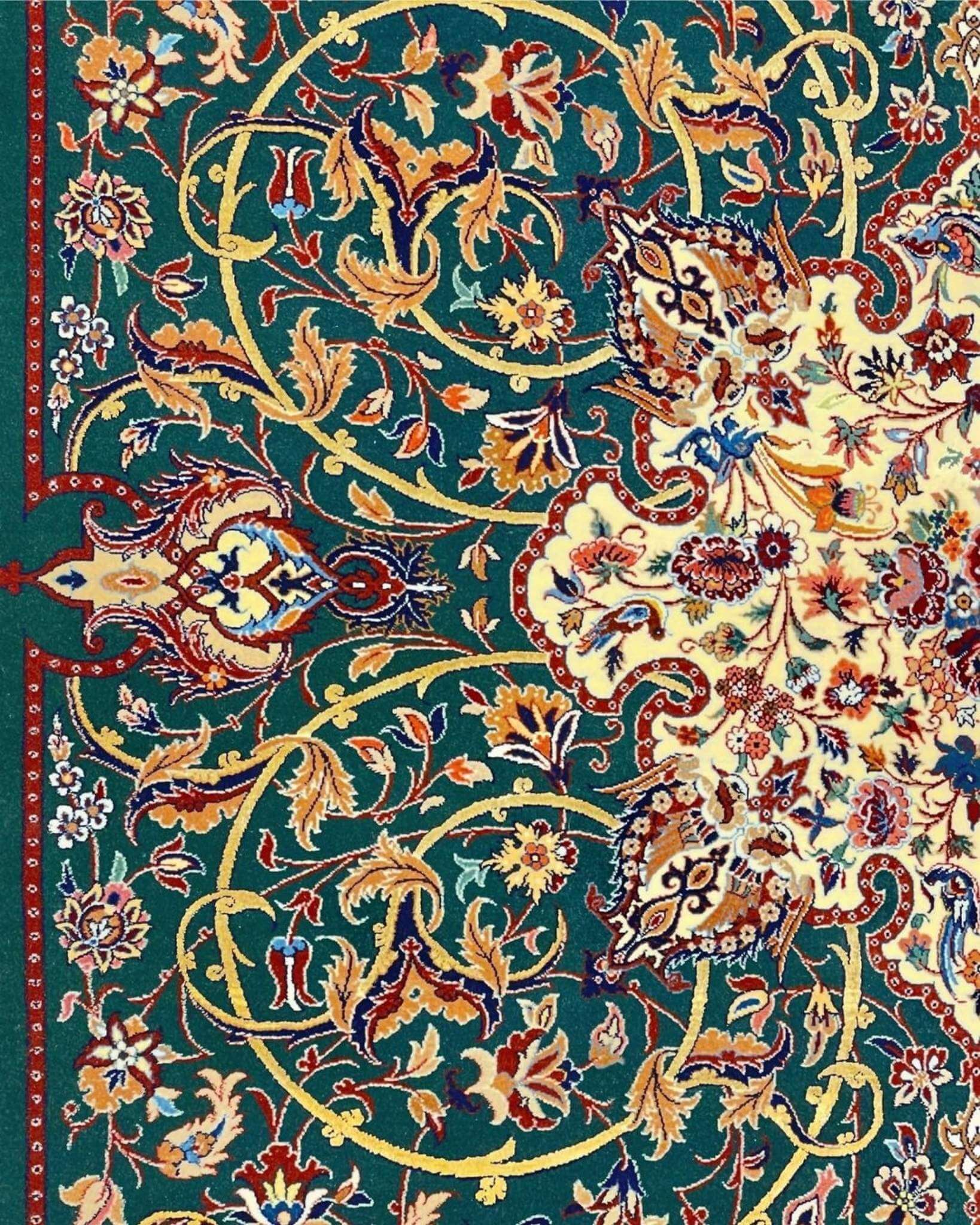 High-quality Persian carpet with emerald green base and rich traditional designs.
